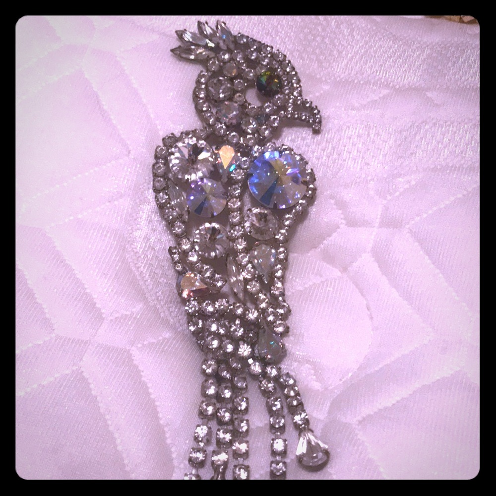 Peacock brooches